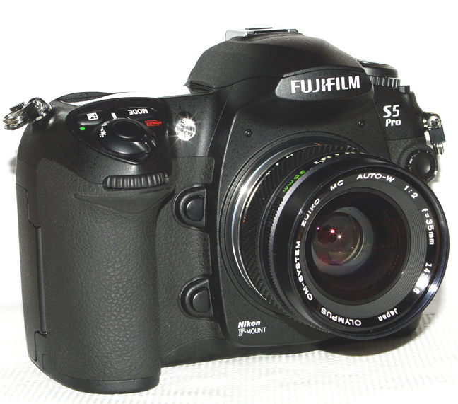 Olympus Nikon 8